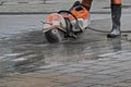 Power cutter in action on a construction site in the city Royalty Free Stock Photo