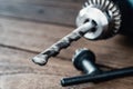 power drill closeup on wooden background Royalty Free Stock Photo