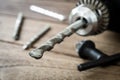 power drill closeup on wooden background Royalty Free Stock Photo