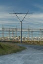 Power Electrical Lines From Hydro Electric Plant by Road and Power Station Royalty Free Stock Photo