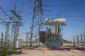 Power electrical substation with high voltage equipments. Electric high voltage station. Power lines and transformer