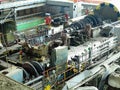 Power generator steam turbine in repair process, machinery, pipes, tubes at power plant Royalty Free Stock Photo