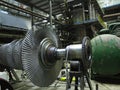 Power generator steam turbine in repair process, machinery, pipes, tubes at power plant Royalty Free Stock Photo