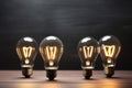 The power of great ideas depicted by light bulbs on a chalkboard Royalty Free Stock Photo