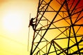 Power grid and worker Royalty Free Stock Photo