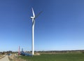 Installing a new windmill or wind turbine in a field. Power industry