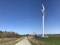 Installing a new windmill or wind turbine in a field. Power industry