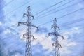 Power line against a cloudy sky. Two poles with electric main wires and clouds. Transmission of electricity on wires in the Royalty Free Stock Photo