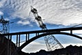 Power line cable, Bridge with mountain, White clouds and blue skies Royalty Free Stock Photo