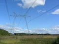 The power line goes through the field