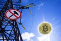 Power line with a mining ban sign. BTC coin instead of the sun. Royalty Free Stock Photo