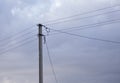 A power line pole with electrical wires isolated against the sky. Power line, power supply Royalty Free Stock Photo