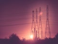 Power line poles at Sunset. Royalty Free Stock Photo