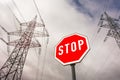 Power line and stop sign Royalty Free Stock Photo