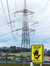 Power line and stop sign Royalty Free Stock Photo