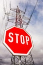 Power line and stop sign Royalty Free Stock Photo