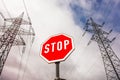 Power line and stop sign Royalty Free Stock Photo