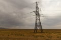 Power line support in the steppe Royalty Free Stock Photo