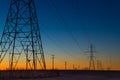 Power line towers during blue hour Royalty Free Stock Photo