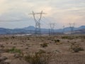 Power Line Towers at Sunset after Storm in Desert Southwest Royalty Free Stock Photo