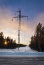 Power line in winter at dawn Royalty Free Stock Photo