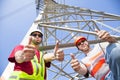 power line workers with thumbs up Royalty Free Stock Photo