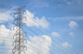 Power lines against the blue sky Royalty Free Stock Photo