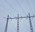 Power lines against a cloudy grey sky