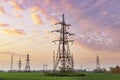 Power lines against sunset sky Royalty Free Stock Photo