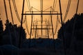 Power lines against sunset sky Royalty Free Stock Photo