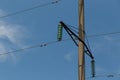 Power lines on background of blue sky close-up. Electric hub on pole Royalty Free Stock Photo