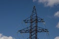 Power lines on background of blue sky close-up. Electric hub on pole. Electricity equipment with copy space. Wires of Royalty Free Stock Photo