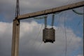 Power lines on background of blue sky close-up. Electric hub on pole. Electricity equipment with copy space. Wires of Royalty Free Stock Photo