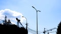 Power lines on blue sky background Royalty Free Stock Photo