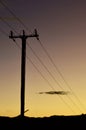 Power lines by a country road Royalty Free Stock Photo