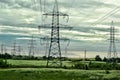 Power lines in the field Royalty Free Stock Photo