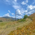 Power lines and hiking trail on a hill in Tooele Royalty Free Stock Photo