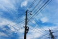 Power lines on an old concrete pole. bottom-up view Royalty Free Stock Photo