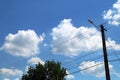 Electric power pole and high voltage cables. Royalty Free Stock Photo