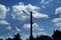 Electric power pole and high voltage cables. Royalty Free Stock Photo