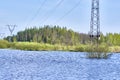 Power lines on the river bank color