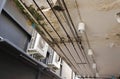 Power lines run under ceiling of worn out canopy Royalty Free Stock Photo