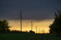 power lines at sunset, high voltage post,High voltage tower sky sunset background Royalty Free Stock Photo