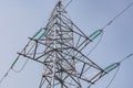 Power lines and towers - a modern high voltage power system. Against the background of the blue sky Royalty Free Stock Photo