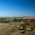 Power lines wind turbines Royalty Free Stock Photo