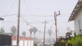 Power lines or wires on poles California city street, USA. Electricity supply.