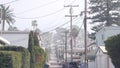 Power lines or wires on poles California city street, USA. Electricity supply.