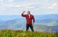 Power of nature. Man stand on top of mountain landscape background. Natural power. Masculine power. Tourist walking