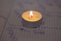 Power outage. Home school assignments are about candles. Elementary school math problems and a candle. Royalty Free Stock Photo