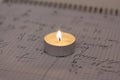 Power outage. Home school assignments are about candles. Elementary school math problems and a candle. Royalty Free Stock Photo